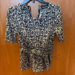 Zara Black and White Patterned peplum blouse